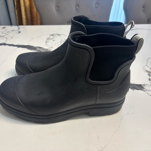 Ugg short rain boots are a stylish and practical footwear design. - Picture 3 of 6